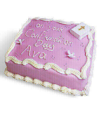Pink Frosted Cake With 'On Your Confirmation Day' Written In Icing